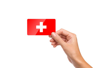 Beautiful hand holding Switzerland flag card on white background