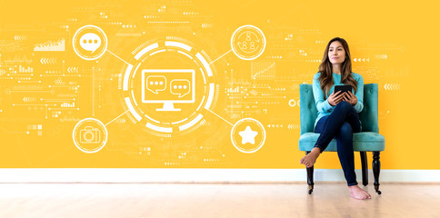 Social media theme with young woman holding a tablet computer