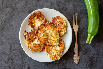 Crispy zucchini fritters with egg, flour and onion.