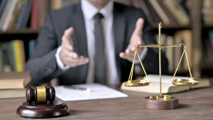 Close up Shoot of Judge Hand while Conversation in Court Room