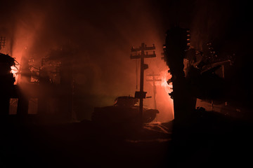 War Concept. Military silhouettes fighting scene on war fog sky background, World War Soldiers Silhouette Below Cloudy Skyline At night.