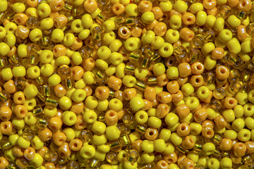 Macro photography of some colorful beads of different shape used for manufacturing jewerly and accesories.