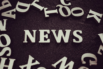 News word concept. News word on blackboard