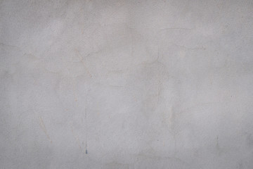 Texture of gray concrete wall surface. Some crack and scratch, suitable for use as a pattern or  background image.