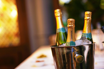 Bottles of champagne on ice bucket