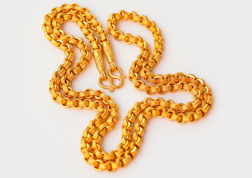 Gold Necklace Isolated On A White Background.