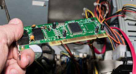Computer engineer installs a working unit