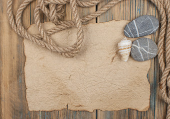 vintage paper and rope on wooden board