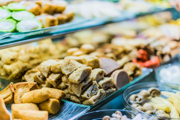 Traditional Asian food ingredients and dishes sold in a singapore restaurant