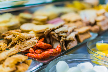 Traditional Asian food ingredients and dishes sold in a singapore restaurant