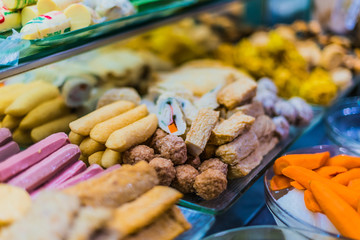 Traditional Asian food ingredients and dishes sold in a singapore restaurant
