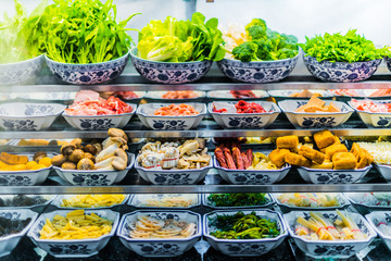 Traditional Asian food ingredients and dishes sold in a singapore restaurant