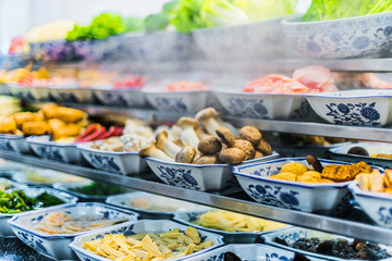 Traditional Asian food ingredients and dishes sold in a singapore restaurant