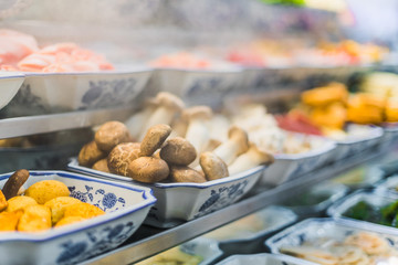 Traditional Asian food ingredients and dishes sold in a singapore restaurant