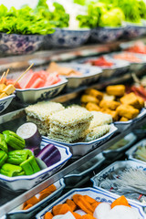 Traditional Asian food ingredients and dishes sold in a singapore restaurant