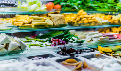 Traditional Asian food ingredients and dishes sold in a singapore restaurant