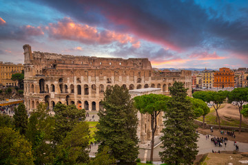 Fototapeta na wymiar The Colosseum in Rome at sunrise, Italy