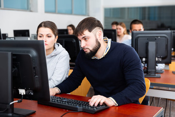 University students are engaged in computer class