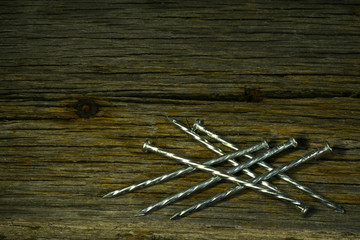 steel galvanized twisted nails on old boards