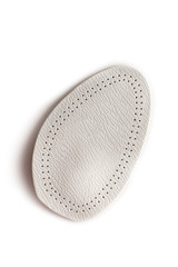 Orthopedic silicone heel from corns for the correction of different lengths of legs isolated on white background