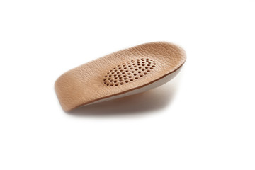 Orthopedic silicone heel from corns for the correction of different lengths of legs isolated on white background
