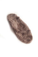 Isolated orthopedic insole on a white background. Treatment and prevention of flat feet and foot diseases. Foot care, comfort for the feet. Wear comfortable shoes. Medical insoles.