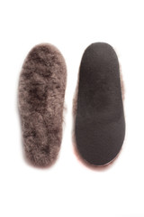 Isolated orthopedic insole on a white background. Treatment and prevention of flat feet and foot diseases. Foot care, comfort for the feet. Wear comfortable shoes. Medical insoles.