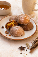 traditional Russian honey cake or gingerbread called pryanik. Spice cake with fruit jam and honey filling authentic Russian dessert