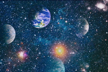 Night sky with stars and nebula. Elements of this image furnished by NASA