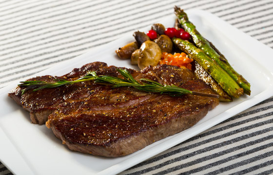 Prepared steak entrecote  of beef  with mushroom and asparagus