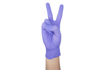 Hand of surgeon with a blue medical glove showing victory sign, isolated on a white background