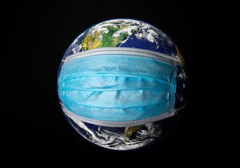View of planet Earth with a medical mask on. Concep for world wide spread of Coronavirus desease