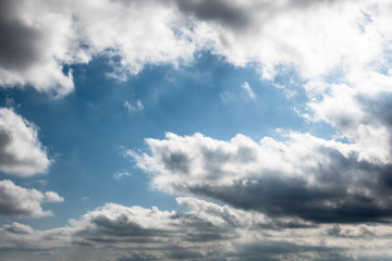 White clouds in a bright blue sky. The beauty of the nature