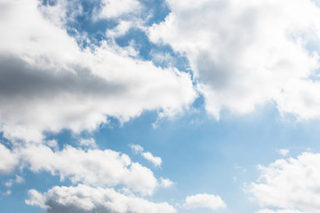 White clouds in a bright blue sky. The beauty of the nature