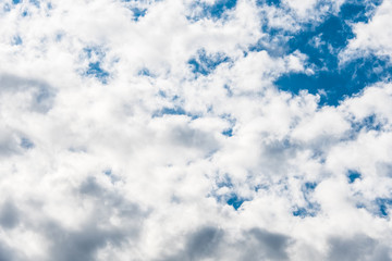 White clouds in a bright blue sky. The beauty of the nature