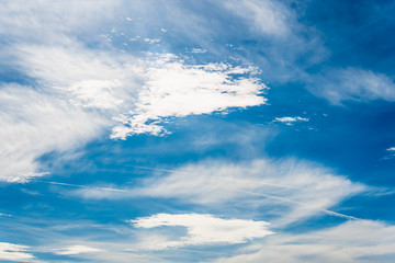 White clouds in a bright blue sky. The beauty of the nature