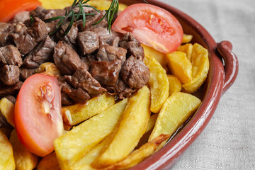 Traditional dish of Madeira island, called “Picado” or “Picadinho”, prepared with beef cut...
