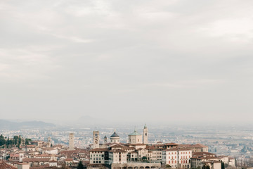 Fototapeta na wymiar Nice panoramic view of Città Alta in Bergamo, Italy. With the horizon in the background
