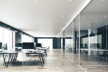 Minimalistic coworking glass office interior.