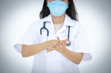 The female doctor taught how to wash hands properly with alcohol gel. To prevent covid-19, corona ,...