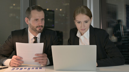 The Business people Working on Laptop at Night