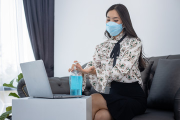 Women working to clean hands with alcohol gel To prevent pathogens covid-19, corona , sars ,...