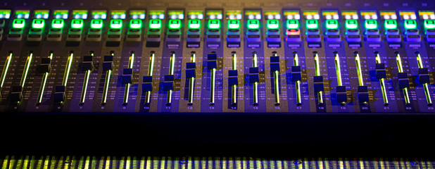 Digital mixer in a recording Studio. Work with sound. The concept of creativity and show business.