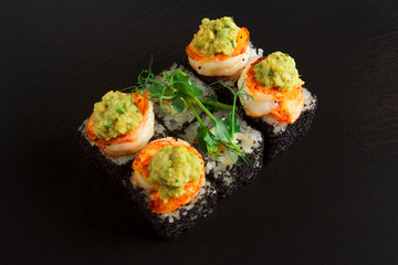 Japanese food: Set of salmon sushi and rolls with salmon and eel