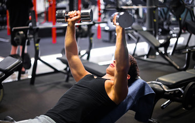 Man training his chest in the gym