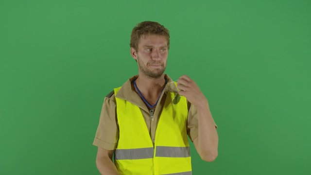 Adult Man Police Officer On An Emergency Put Glasses On An Whistles With Indifference Studio Isolated Shot Against Green Screen Background