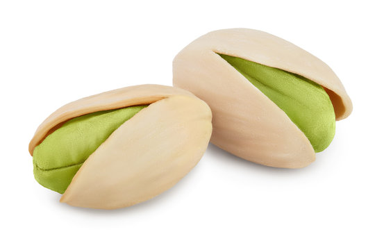 pistachio with leaves isolated on white background with clipping path and full depth of field