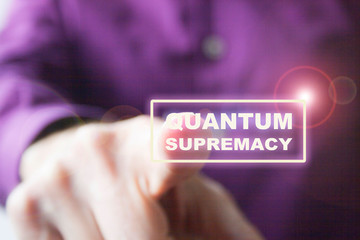 Pressing a virtual quantum supremacy  button a right hand of a Caucasian man in purple shirt