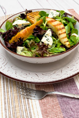 Bitter green salad with roasted pears