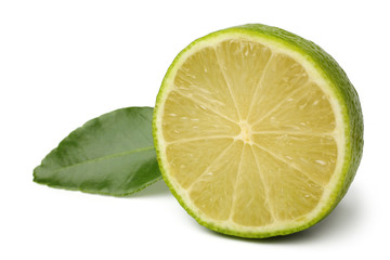 Fototapeta na wymiar Fresh lime with green leaf
